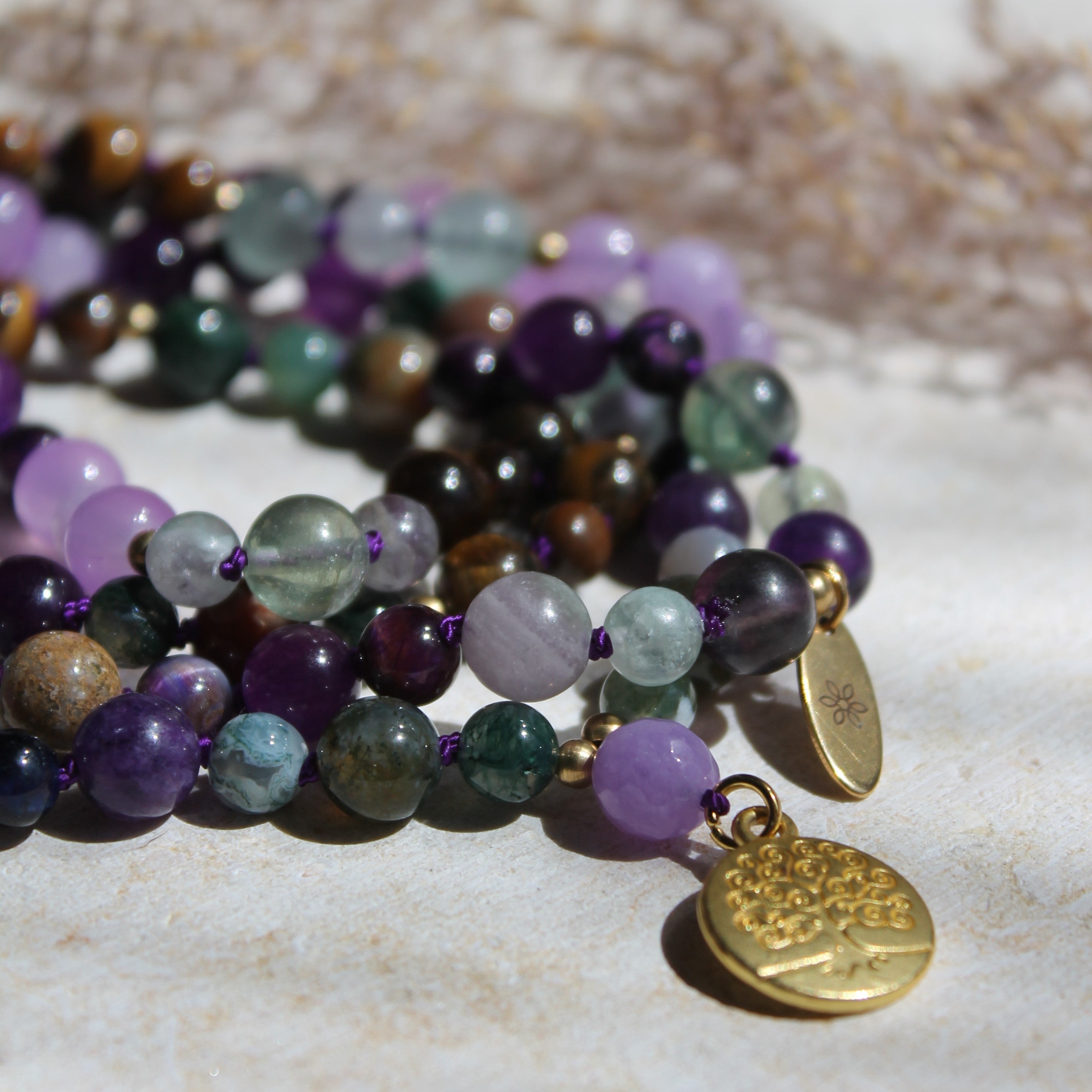 Fluorit, Amethyst, Moosachat, Tigerauge Mala goldfarben