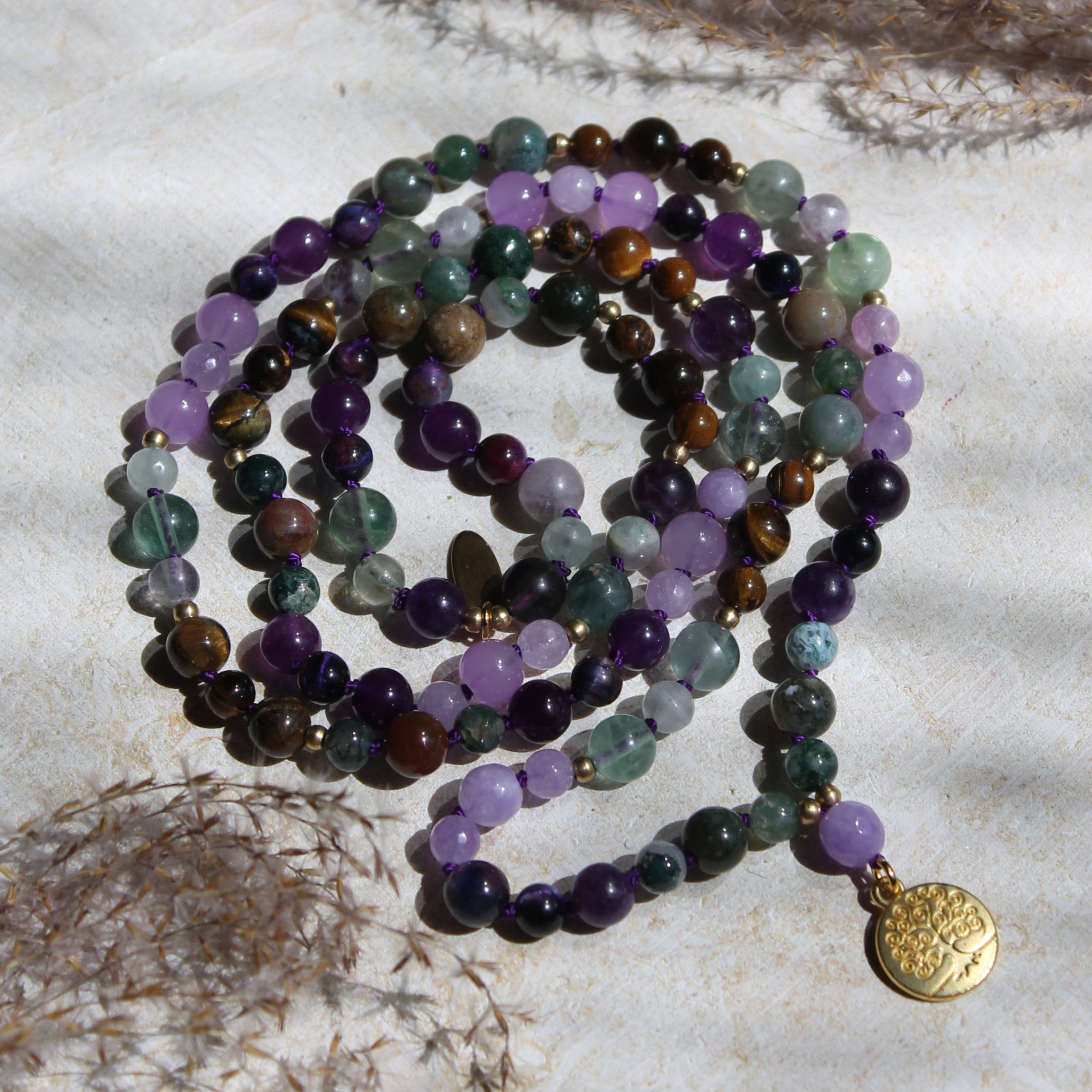 Fluorit, Amethyst, Moosachat, Tigerauge Mala goldfarben