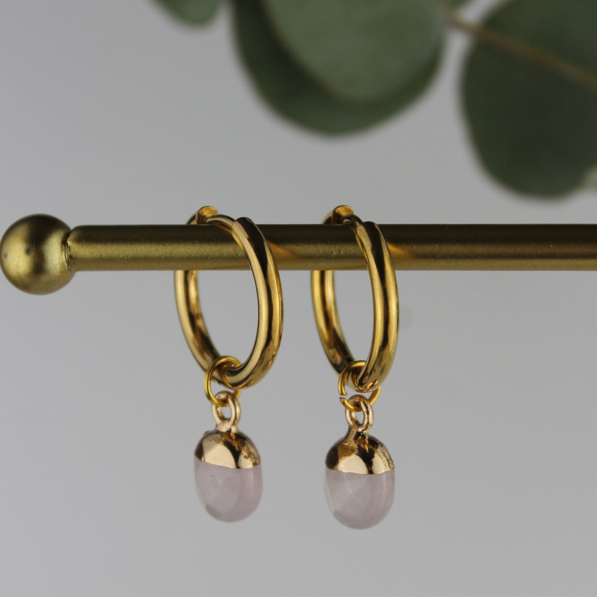 Rosenquarz Edelsteinohrringe oval goldfarben