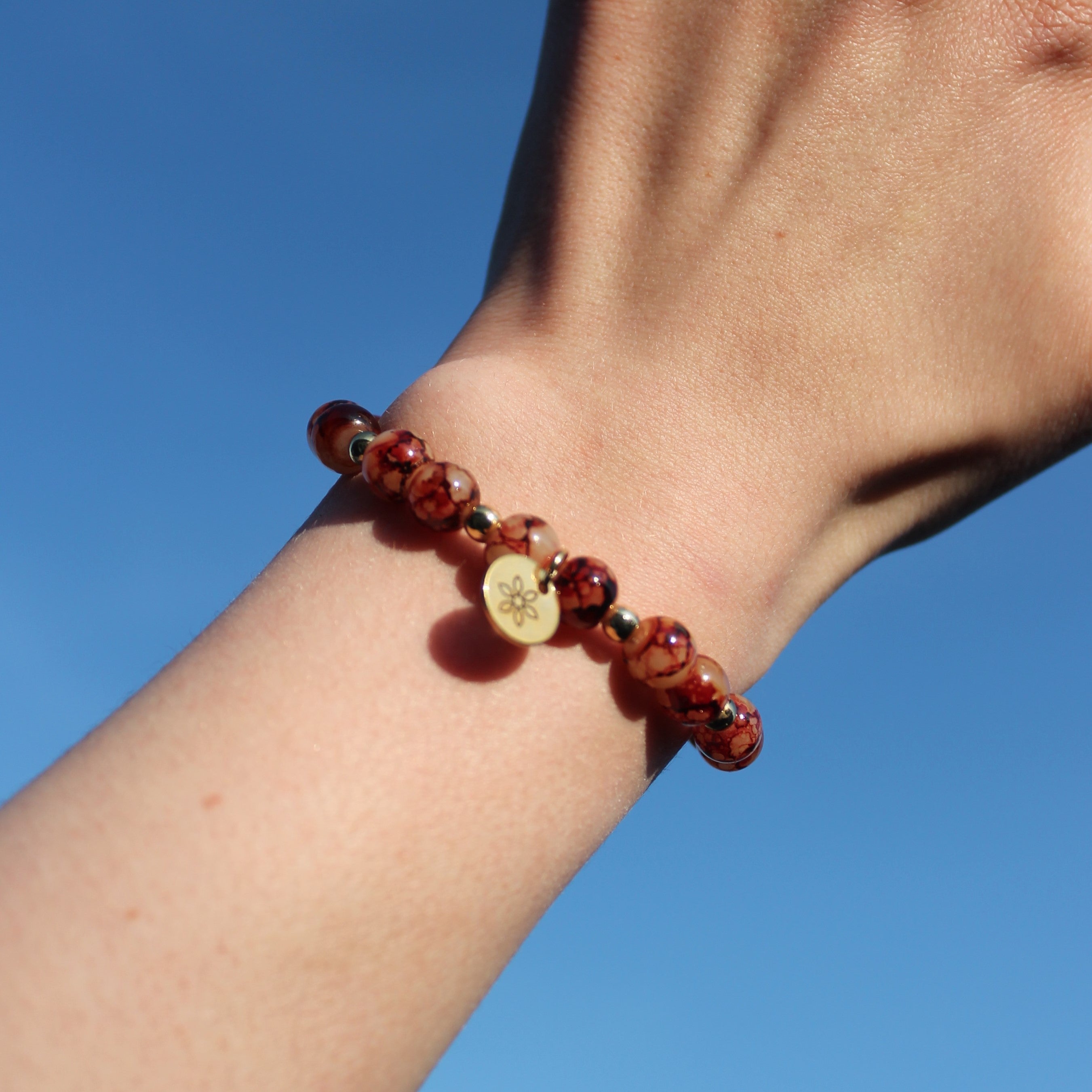 Perlenarmband rot mit Hämatit goldfarben