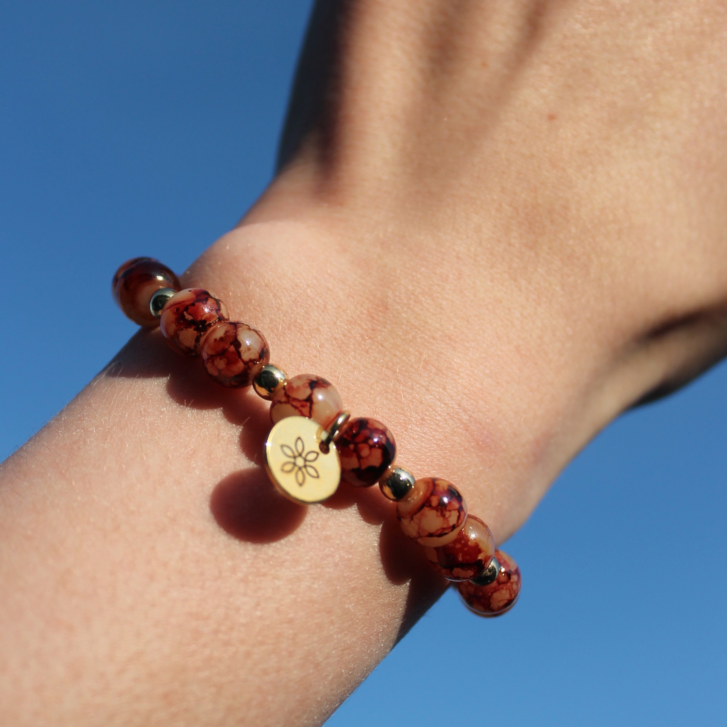 Perlenarmband rot mit Hämatit goldfarben