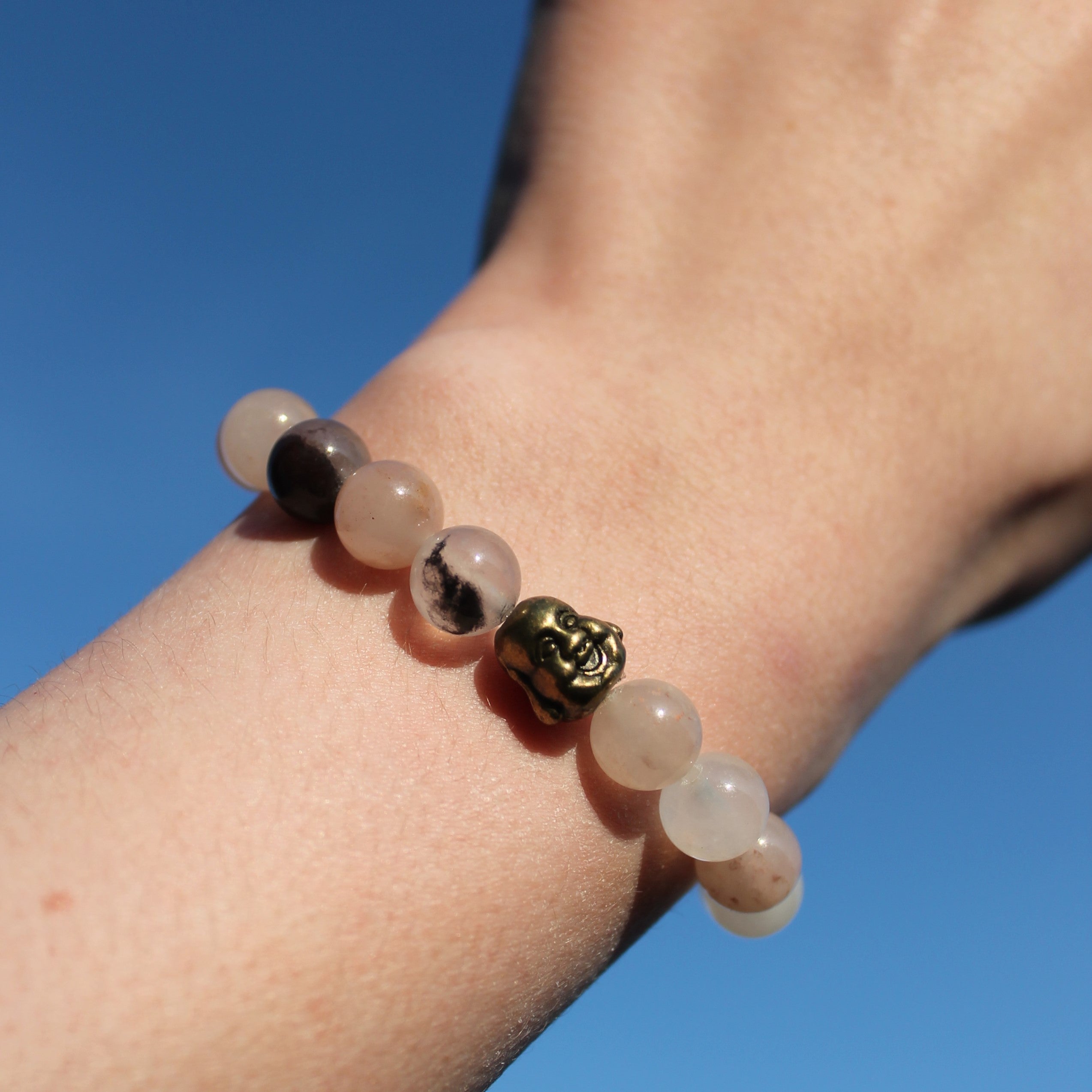 Sonnenstein Edelsteinarmband mit Hotei goldfarben