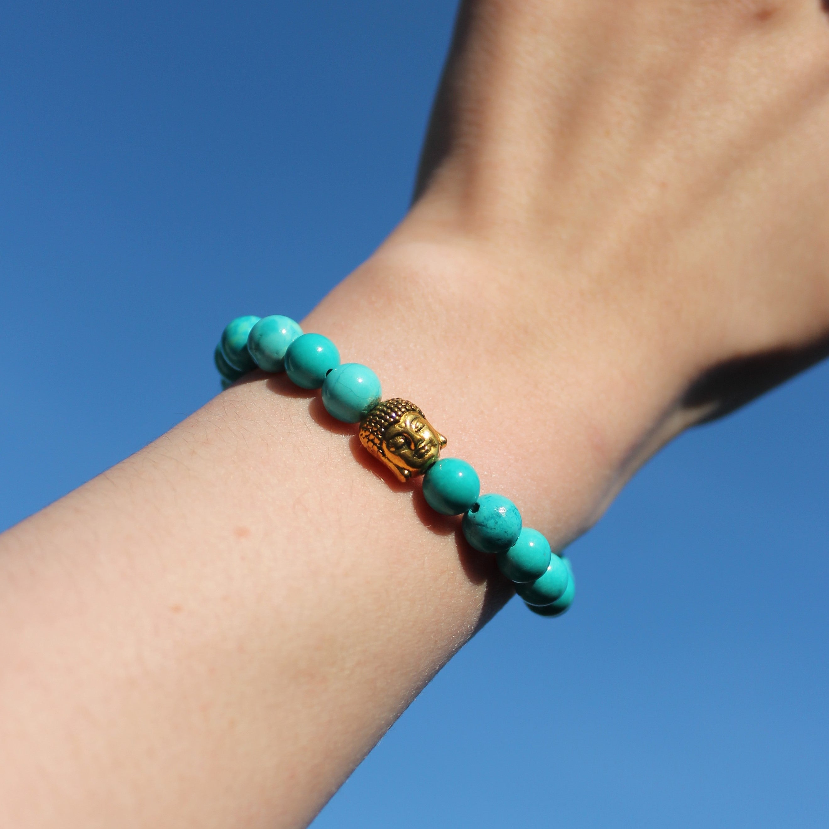 Türkis Edelsteinarmband mit Buddha goldfarben