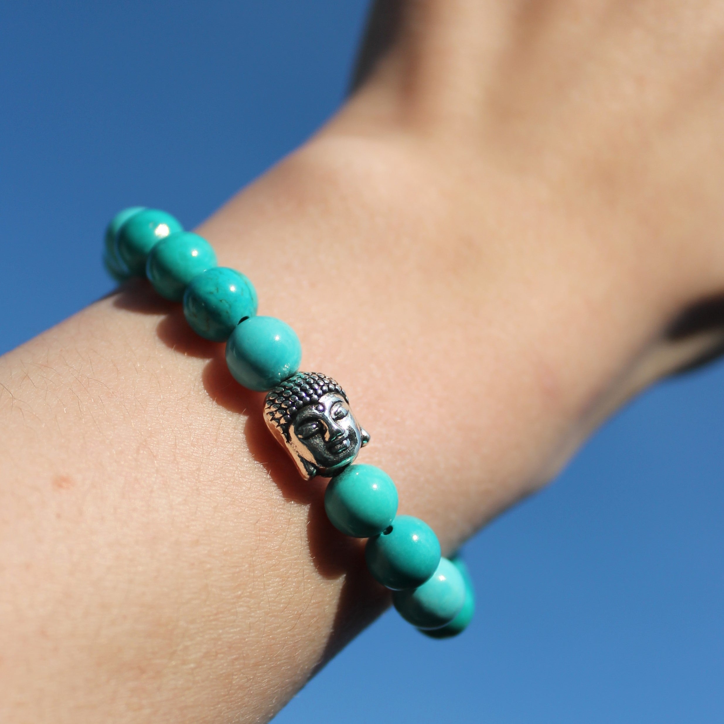 Türkis Edelsteinarmband mit Buddha silberfarben
