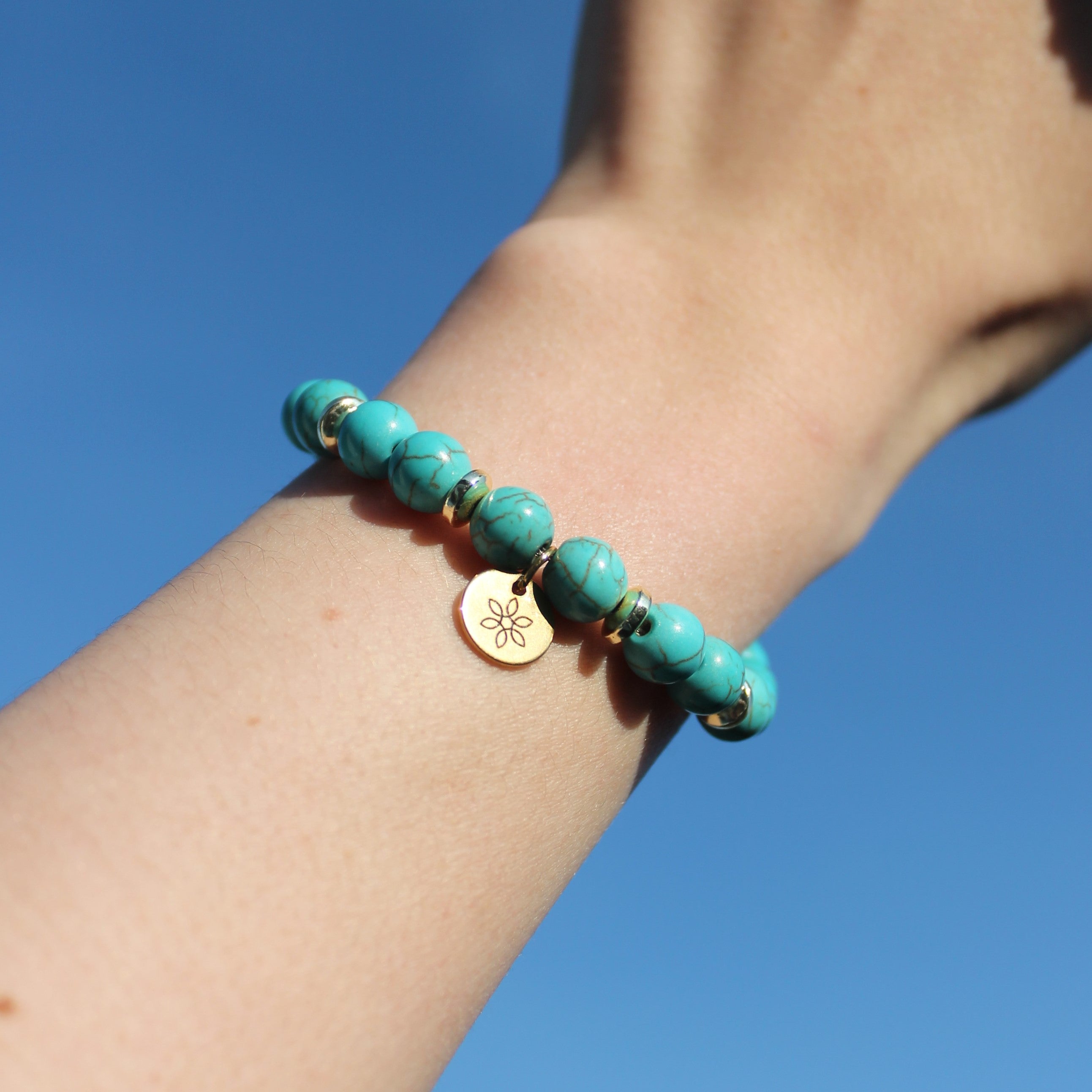 Türkis Edelsteinarmband mit Hämatit Scheiben goldfarben