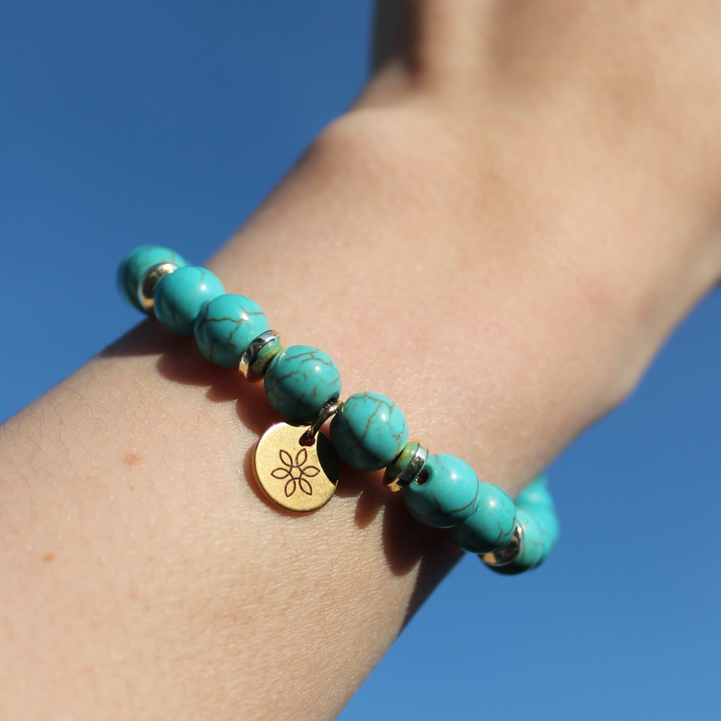 Türkis Edelsteinarmband mit Hämatit Scheiben goldfarben