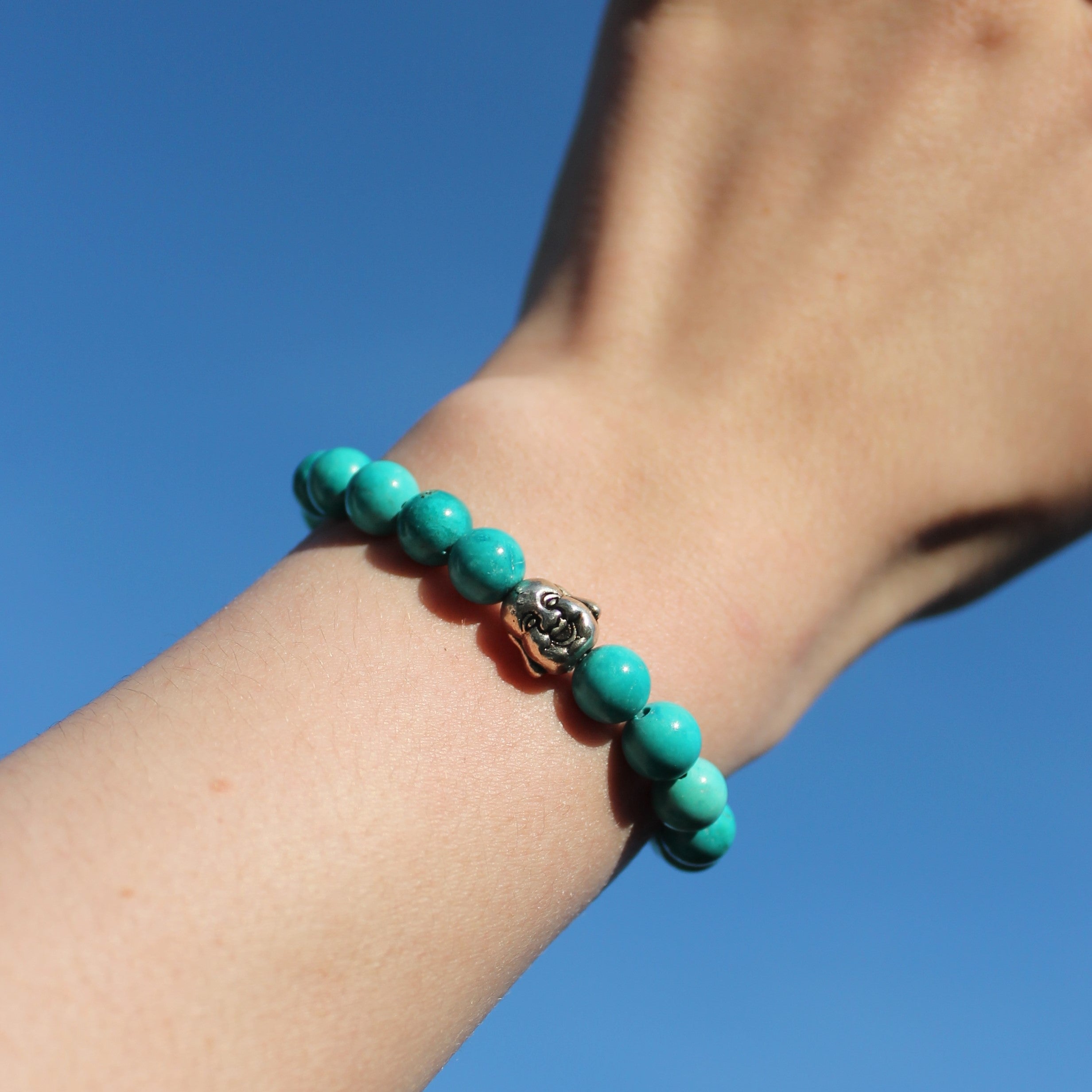 Türkis Edelsteinarmband mit Hotei silberfarben