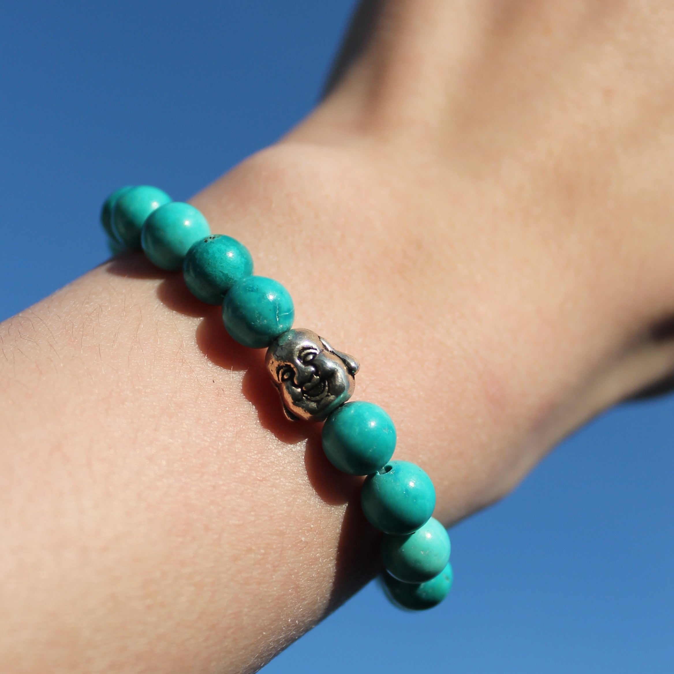 Türkis Edelsteinarmband mit Hotei silberfarben
