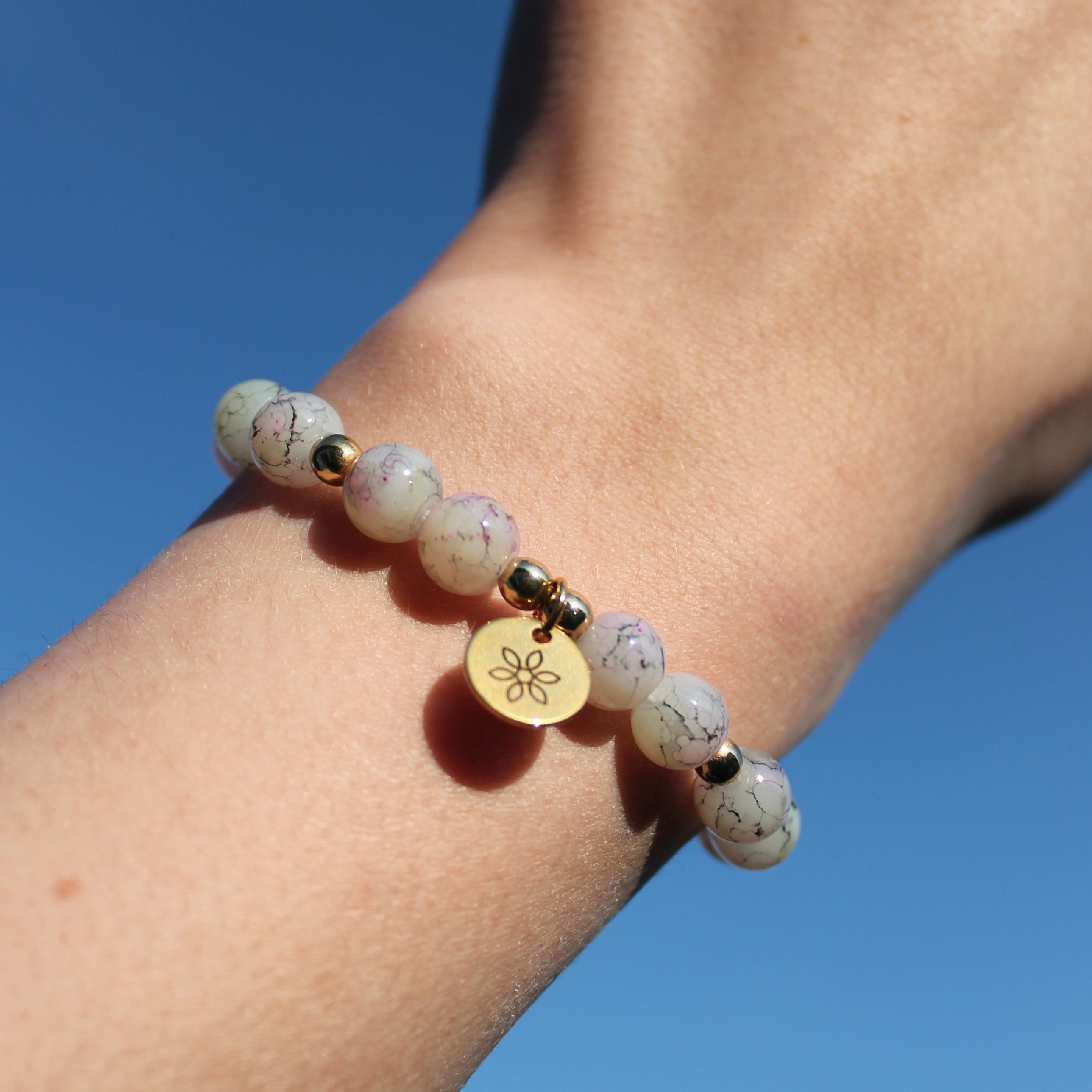 Perlenarmband lila mit Hämatit goldfarben