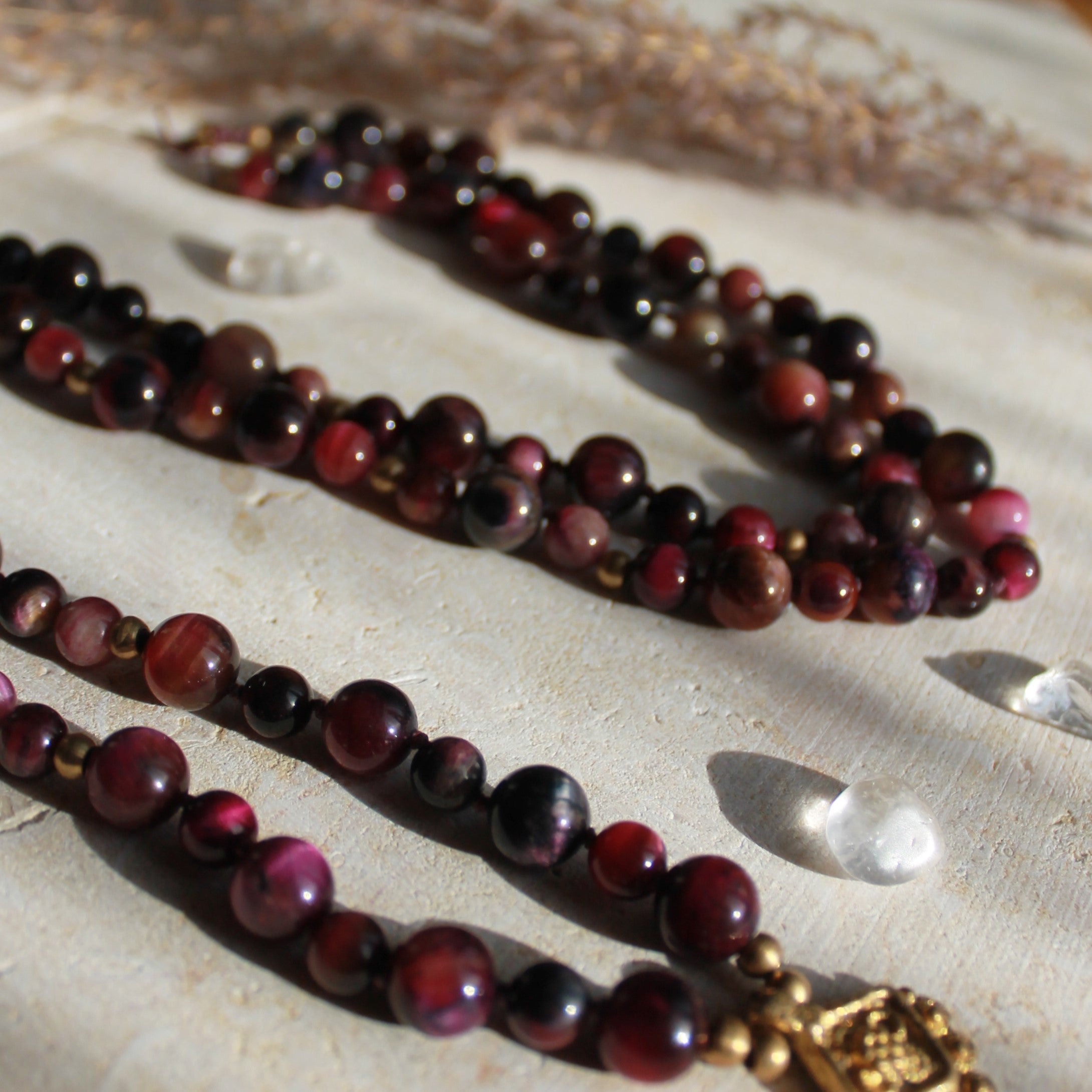 Pinker Tigerauge Mala goldfarben