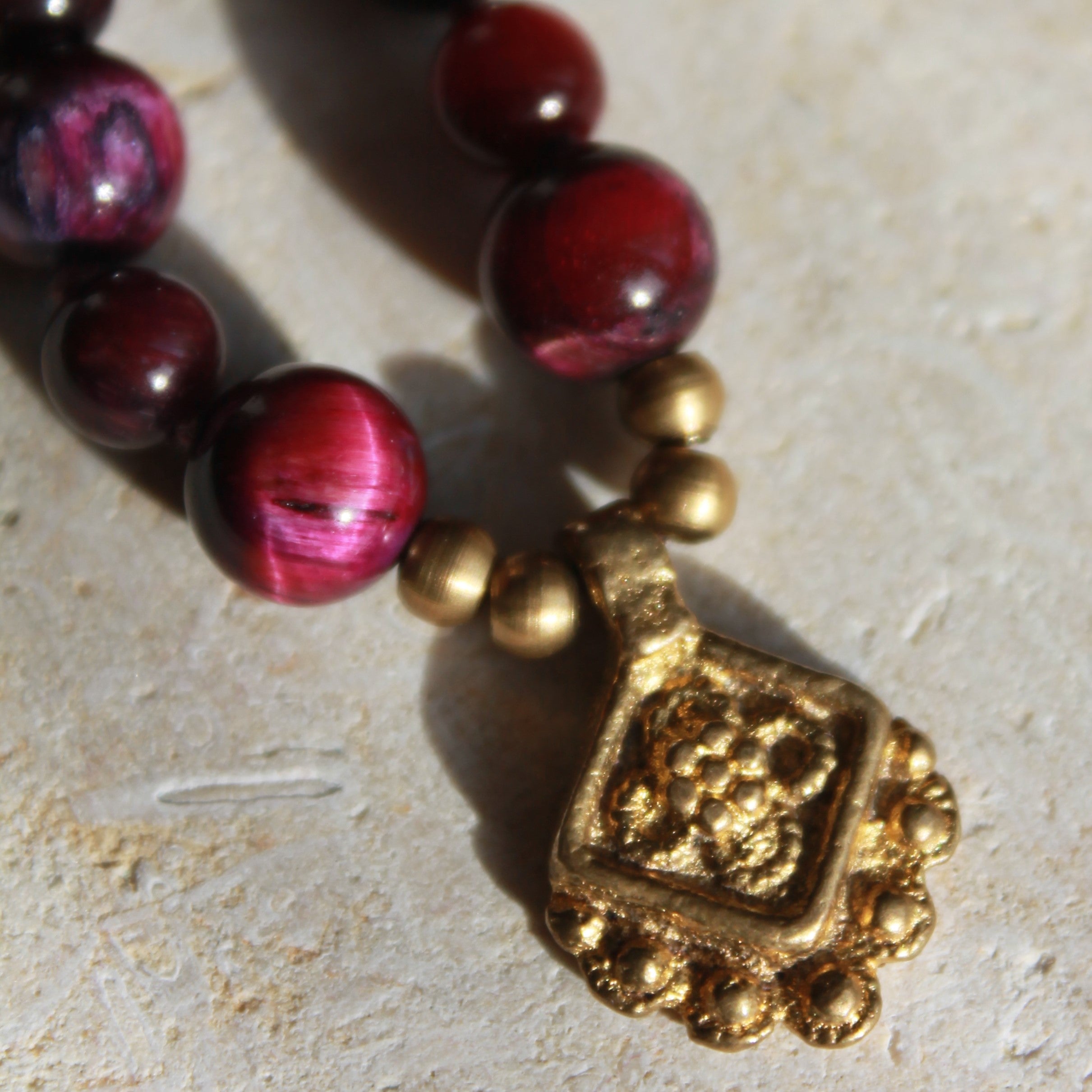 Pinker Tigerauge Mala goldfarben